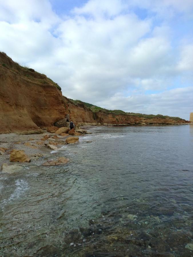 Casa Marina Lu Tuvaraggiu Casa Vacanze Sorso Bagian luar foto